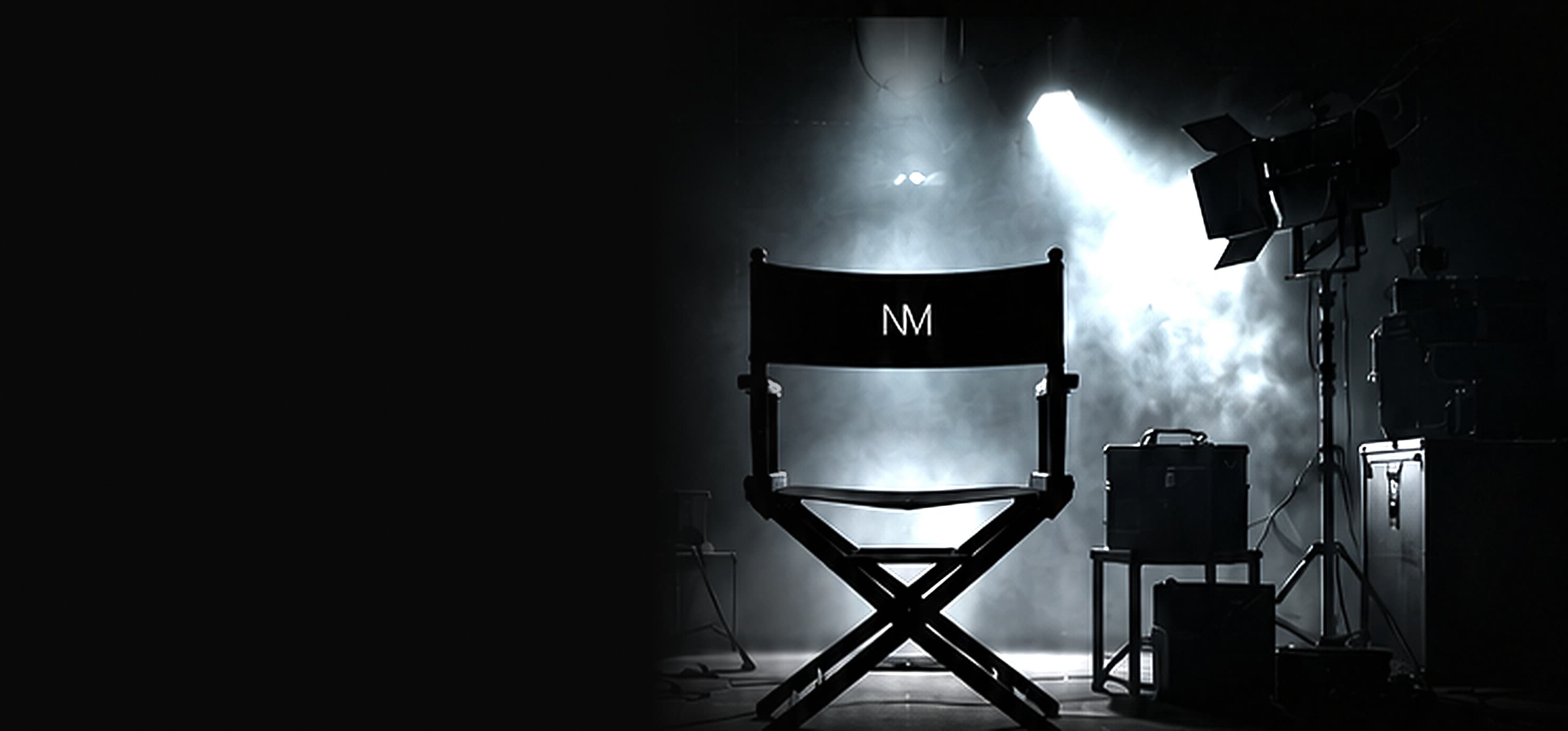 Director's chair on a smoke-lit film set